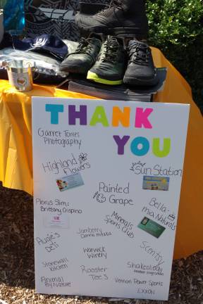 A &quot;Thank You&quot; poster lists the names of many of the local supporters of the fundraising event.