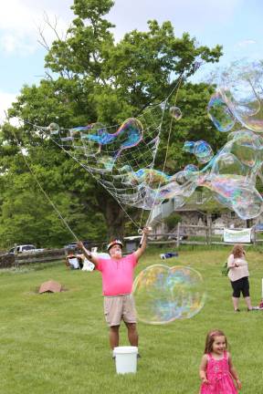Bubbleman Edward J Miller entertains the children at the Medicine Wheel Event on Saturday