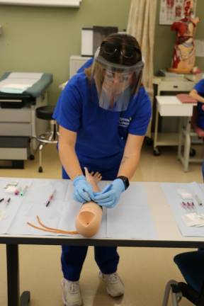 SCCC adds 2 courses to Allied Health Program A student learns phlebotomy techniques in the Medical Assistant program. (Photo courtesy of Sussex County Community College)