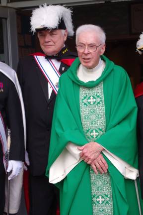 Celebration in honor of Father Bob’s retirement Monsignor Robert Carroll, 79, will retire as pastor of Our Lady of Fatima Church after serving for 16 years.