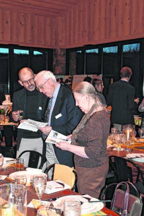 The fundraiser included a charity auction, live music and gourmet food. Guests were asked to bring a special bottle of wine to open there.