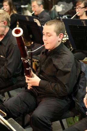 Vernon high school orchestra rehearses with pros Frank Incarnato on bassoon