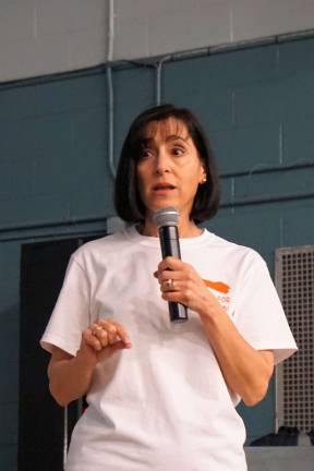 Principal Rosemary Gebhardt introduces the Walnut Ridge Earth Day and Arbor Day Assembly.