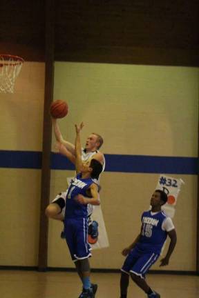 Local athlete racks up 1,000 points Photo provided David Amels going for a shot.