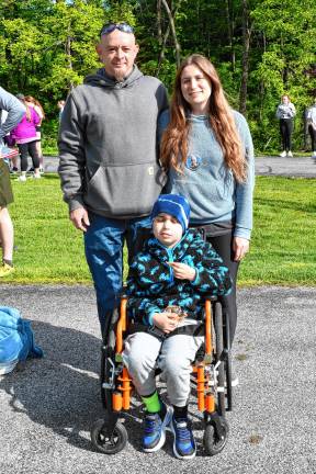 Photos: Vernon Spring 5K <b>Benny Torres; his mother, Viviana Florea; and her fiance, Chris Fritter. Benny underwent surgery to fight a tumor that was wrapped around his brain stem when he was 4. Now 8, he has to undergo another surgery.</b>