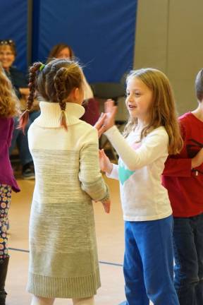 PHOTOS BY VERA OLINSKI Two first graders dance &quot;Sasha.&quot;