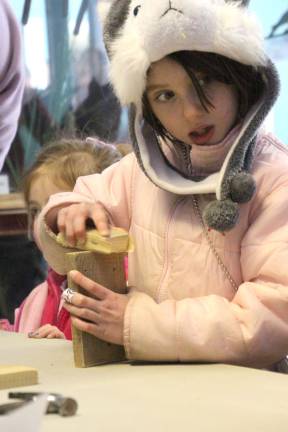Wallkill Valley refuge holds bird count Madeline Norwood Orsi of Wantage is sanding her suit bird feeder project at the Wallkill Wildlife Refuge.