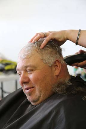 Residents go bald for charity Charlie Kazella of Hamburg