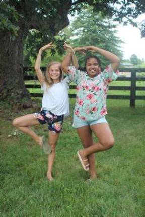 11-year-old Fresh Air child Madyson of the Bronx practices her pirouettes with her 12-year-old Fresh Air sister Addison. &#xa0;The summer sisters&#x2019; favorite activities include berry picking, boating, riding horses, and making up new dances. (Photo provided).