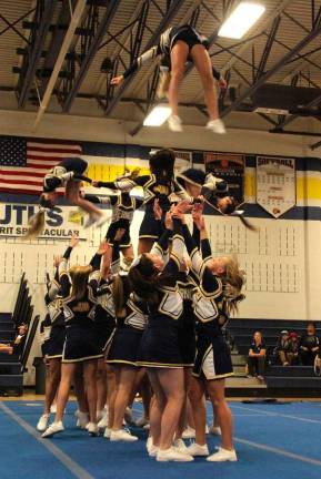 Vernon cheer teams win at competition The Vernon Midget cheer team competes.