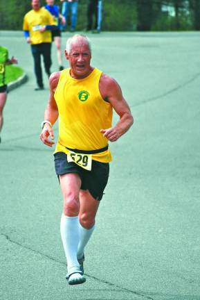 Photo provided Karl Fenske running a local race and wearing a Team Eastern jersey.