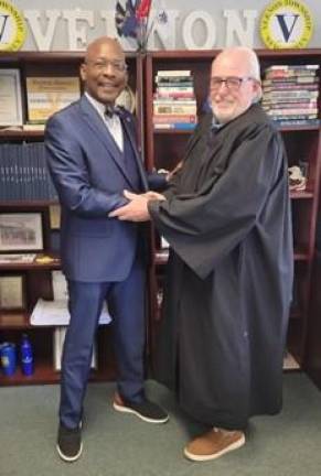Vernon municipal judge to retire Mayor Howard Burrell, left, is shown with retiring judge James Devine
