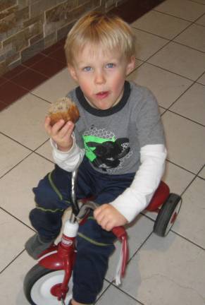 Three- year- old Chase is a powerhouse of energy as he snacks on one of Grandma&#x2019;s fresh muffins.