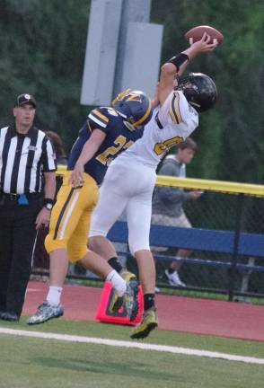 In the first quarter West Milford wideout Kevin Schaeffer accomplishes an amazing touchdown catch over the head of Vernon cornerback Aden Moskovitz.
