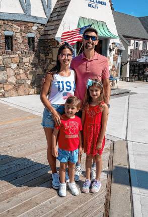 Sparta. Fourth of July events Courtney, Zach, Penelope and Max Tullis.