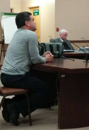 Vernon Township MUA Chairman Vincent Zinno listens during Monday's Vernon Township Council meeting.