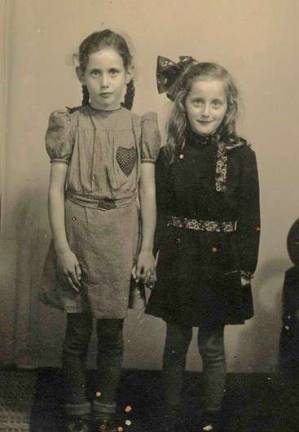 A photo taken in 1943 of siblings Maud and Rita Peper in Oldebroek, a municipality in the Netherlands, a year after the two went into hiding.