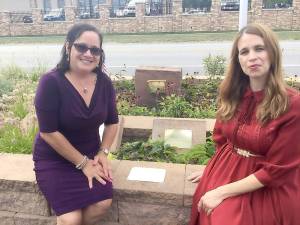 Superintendent Eunice Vargas Perez and Pastor Megan Mead-Bracknell in front of the church’s original cornerstone.