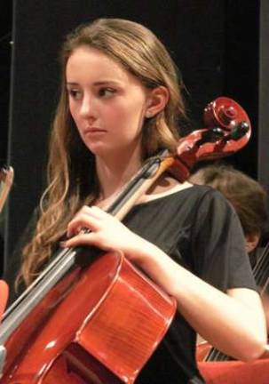 Soloist Kristina Schaberg is shown.