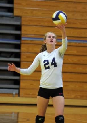 Sparta's Paige Smith about to serve the ball. Smith scored five points and made one ace and one dig.