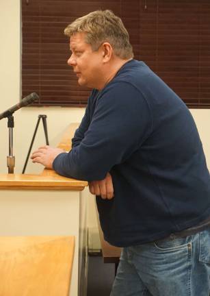 Sussex to raise water, sewer fees Photo by Vera Olinski David Mitchell, chairman of the Clove Lake Maintenance Committee discusses clean-up plans with the Sussux Borough Council on March 31.