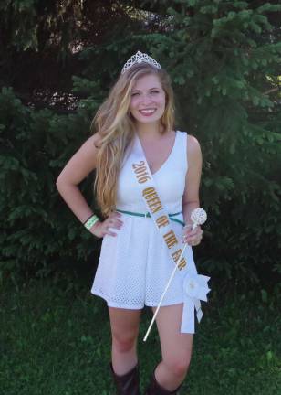 The 2016 Queen of the Fair Kelly Wask holding a scepter and wearing her crown and sash in casual clothes was at the Sussex County Fair in Augusta on Monday, Aug. 8.