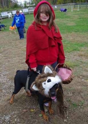 Little Red Riding Hood and her wolf are Amelia Houdershieldt, 8, and her rottweiler Bella, both of Vernon.