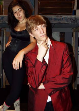 Highland Stage Presents Damn Yankees Mr. Applegate (AKA "The Devil"), played by recent Vernon High School graduate Dominick Gonzalez, 18, plots to win over Joe Hardy's soul and prevent the Senators from winning the pennant with his right-hand temptress Lola (Mariajesus Valdes, 19).