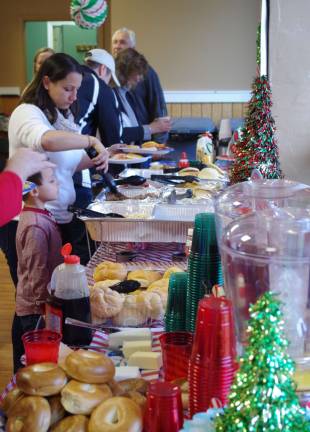 The chow line included pancakes, gingerbread pancakes, bacon, sausage links and patties, fresh fruit, and the like.