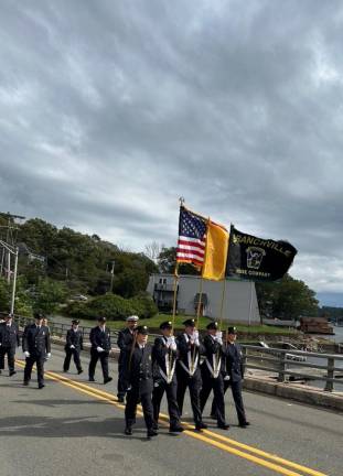 Members of the Branchville Fire Department march in the parade.