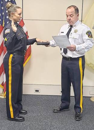 Two veteran correctional officers are promoted Corporal Jamie Caravaggio and Sheriff Michael Strada (Photo provided)