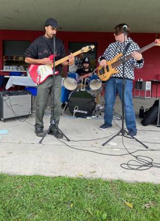 The Freejays band members are, from left, Kay Bee on guitar and vocals, Dan Bangyana on drums, and Dan McGroaty on base.