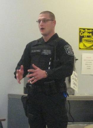 Officer Robert Cottrell of the of the Sussex County Sheriff&#x2019;s Office share important information with members of the Woman&#x2019;s Club and their guests.