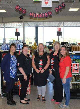 From left, Suzanne Des Rochers, Robin Harvey, Joan Bruse, Carol Novrit and Amanda Pierce bagged groceries at the Newton ShopRite fundraiser.