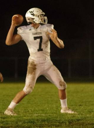 Wallkill Valley quarterback Alex Mastroianni in throw mode in the first half