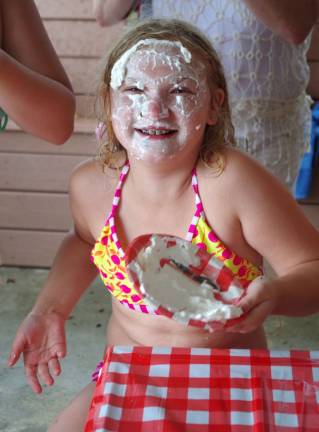 Katie Molini, 10, was the winner after bobbing for M&amp;Ms covered with whipped cream.