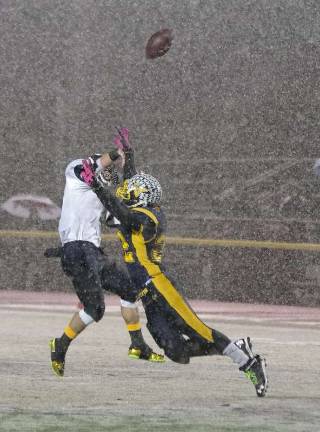 Ramsey wideout turned quarterback Brian Mchale gets the ball off with Vernon's linebacker Luke Venskus in his face.