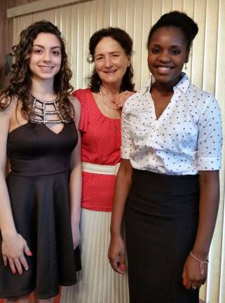 Mariapia Riso, left, and Isabelle Marseille are shown with teacher Margaret Korczynski.