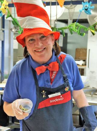 Debbie serves students green eggs and ham.