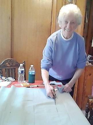 Woman’s club makes pillows for patients Vernon Township Woman’s Club member Barbara Fimia cuts fabric for pillows that she will sew and donate to Newton Memorial Hospital.