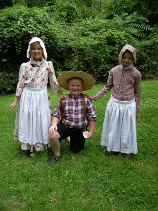 Children dress up in period clothing at the Hands-On History program.