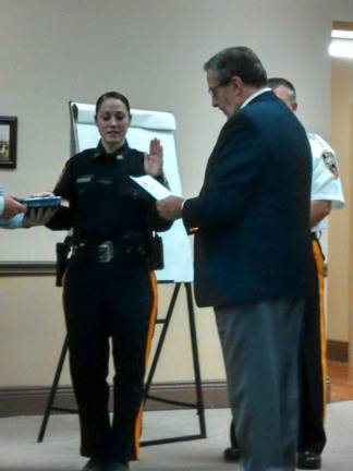 New police officer Miranda Meador was sworn in by Vernon Mayor Victor Marotta at the Township Council meeting on Monday, July 28. The township has hired the new officer in preparation for upcoming retirements in the department in 2015.