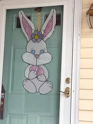 ISpy game offers families a way to play outside, safely A bunny in a door was an Easter-themed ISpy. The game will continue until May.