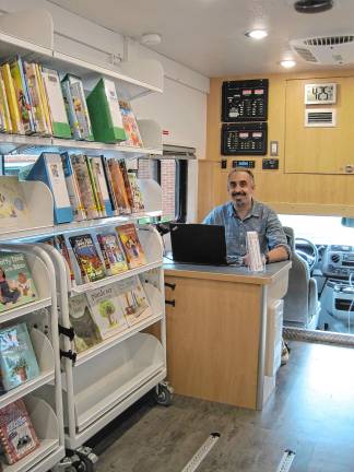 New mobile library launched <b>Ed Sherry, driver of the new mobile library, Dot. </b>