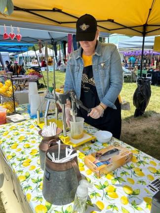 Tamar Dibattista of the Rustic Bee Lemonade makes fresh lemonade.