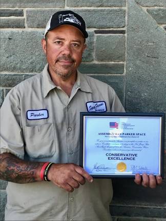 Pictured is Assemblyman Parker Space (R-Sussex, Warren, Morris) with his 2018 Award for Conservative Excellence awarded by the American Conservative Union.