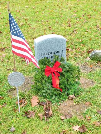 250th celebration begins <b>The gravestone of Revolutionary War veteran Theodorus Polhemus in the Old Newton Cemetery is decorated as part of Wreaths Across America in December 2018. The gravestone was erected in October 2018 as part of a joint effort of the Daughters of the American Revolution, Sussex County Historical Society and Old Newton Cemetery Committee to locate and mark previously unmarked graves. Polhemus was born in Haverstraw, N.Y., and served as a corporal in the Orange County, N.Y., militia. He died in Newton in 1820. (Photo by Mandy Coriston)</b>