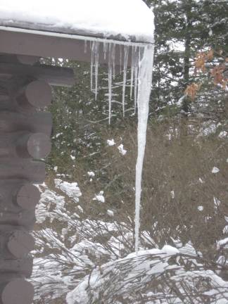 A four-foot icicle formed on a corner of this Highland Lakes' cabin.
