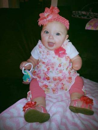 Photo, Jessica Coursen of Sussex Gianna Russell, 8 months old. &quot;Spring is here and I have the keys to happiness and sunshine!&quot;