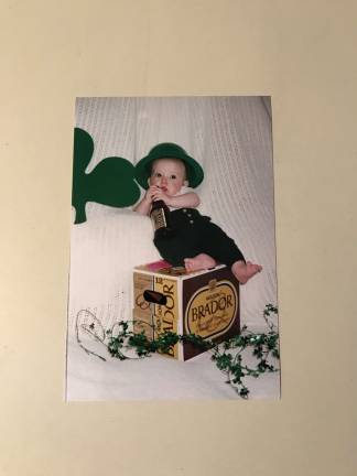 I created a 12 month calendar of my first born son Austin. Every month had a holiday and March had this. My husbands favorite beer, small enough to sit on the case. Austin is pondering when he is old enough will he like this beer. Happy Saint Patrick's Day.